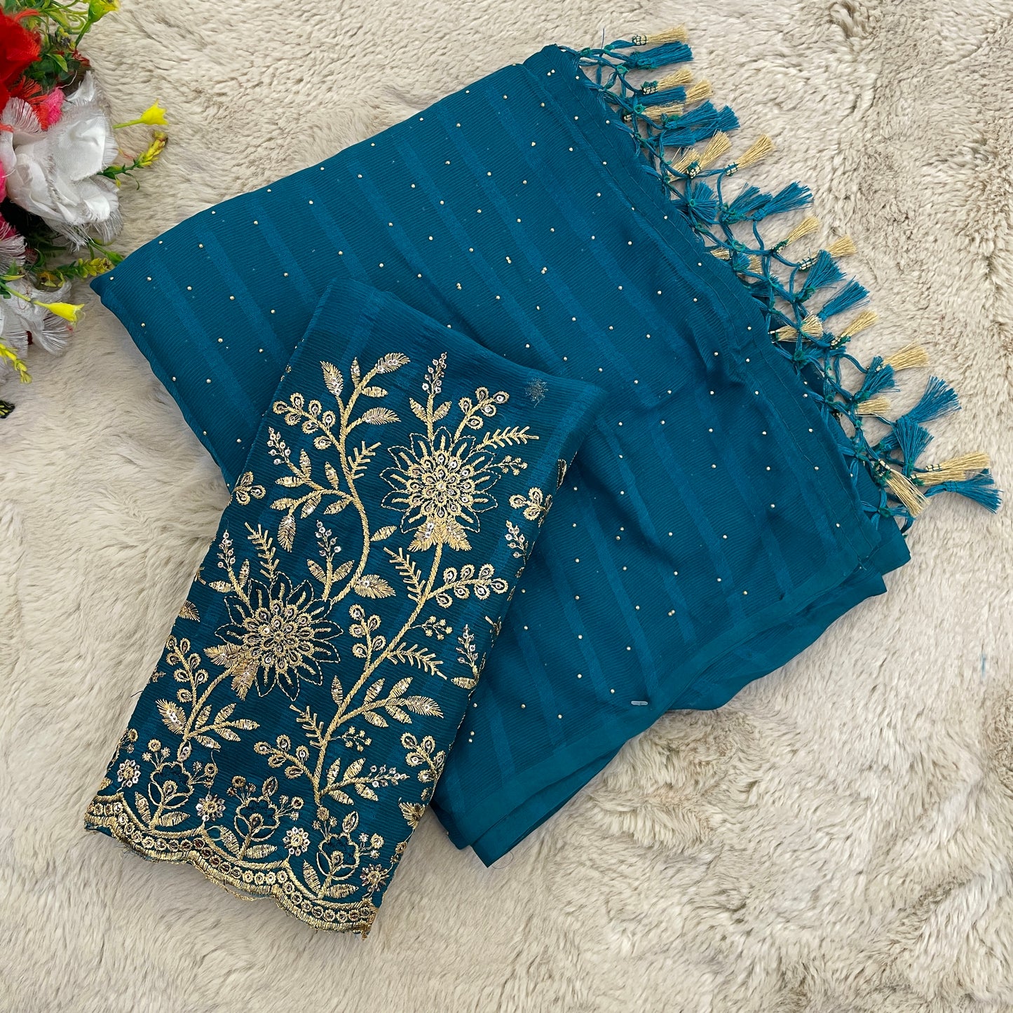 Rimzhim Game Master Saree: Crafted for Perfection.