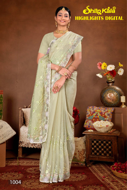 Highlights Glass Tissue Multicolour Fancy Fabric Saree with Stone Work.