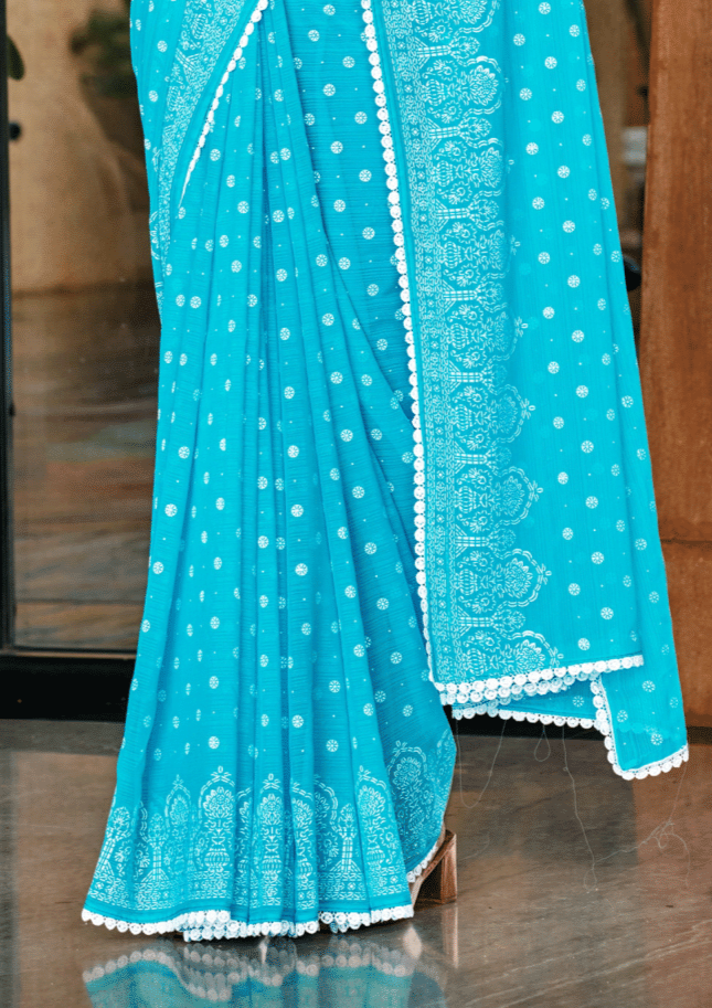 Mario Sky Blue White Cat Chiffon Saree With White Chanderi Blouse And Jhalar.