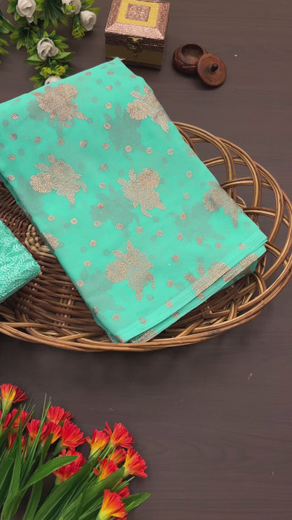 Gorgeous Sea Green Georgette Saree with Foil Printing.