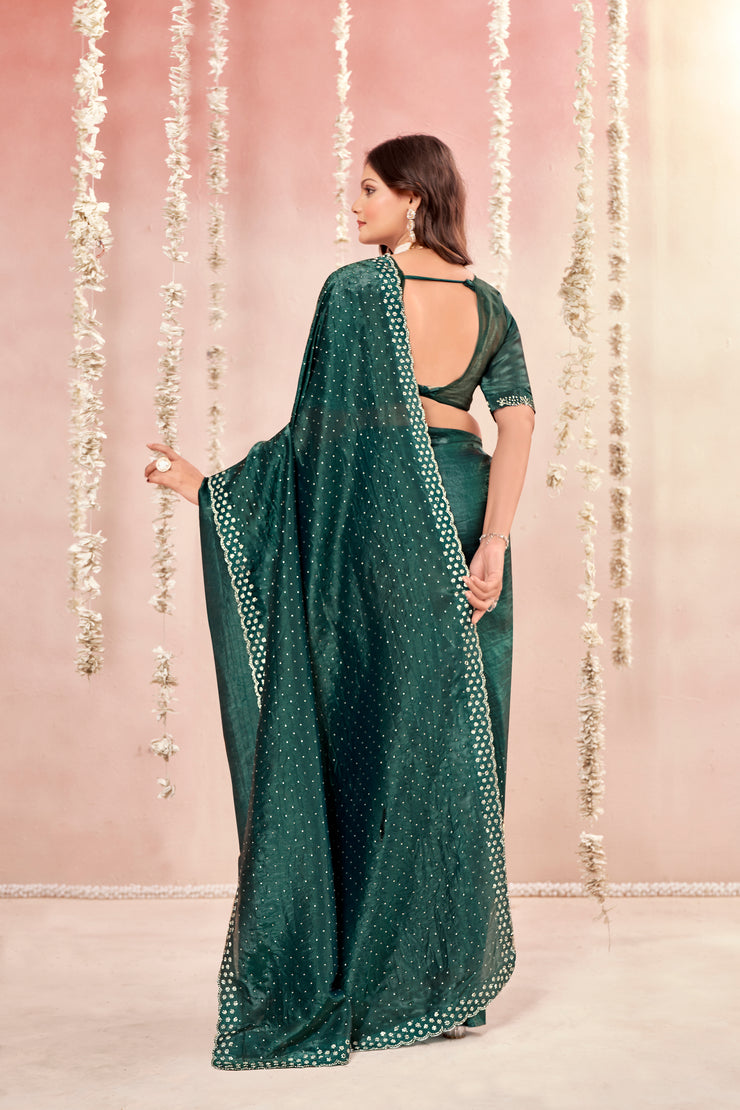 Rose Silk Dark Green Glass Tissue Organza Saree With Tone To Tone Matching And Jarkan Stone Work Concept