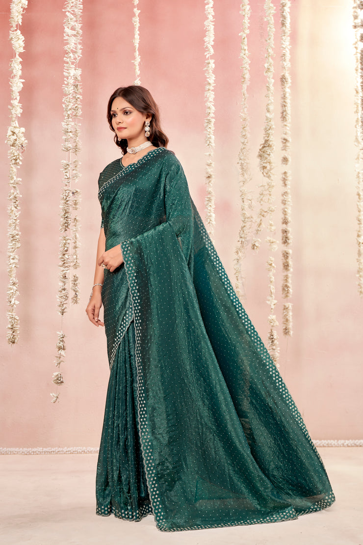 Rose Silk Dark Green Glass Tissue Organza Saree With Tone To Tone Matching And Jarkan Stone Work Concept